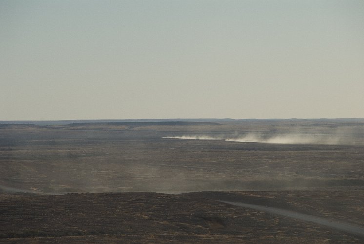 _AU10012.jpg - dust clouds announce a truck